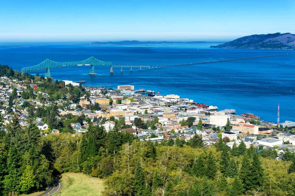 Astoria, Oregon, the first permanent U.S. settlement on the Pacific coast, overlooks the Astoria Megler bridge as it crosses the Columbia river to the state of Washington.