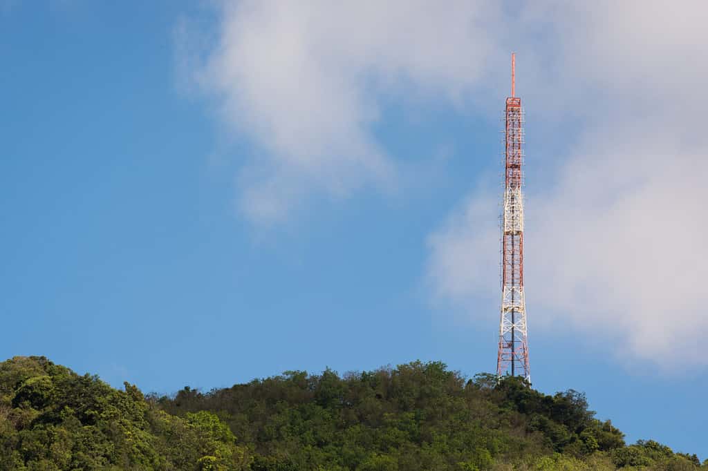 elecommunication mast TV antennas wireless technology with blue sky in the morning