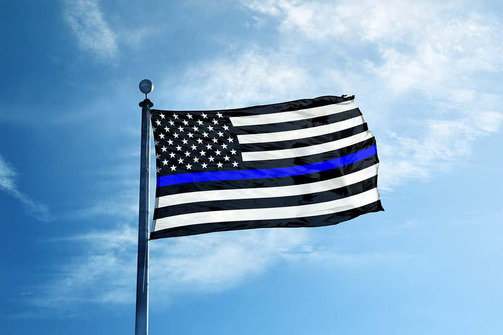 Support the Police Thin Blue Line American Flag on the mast