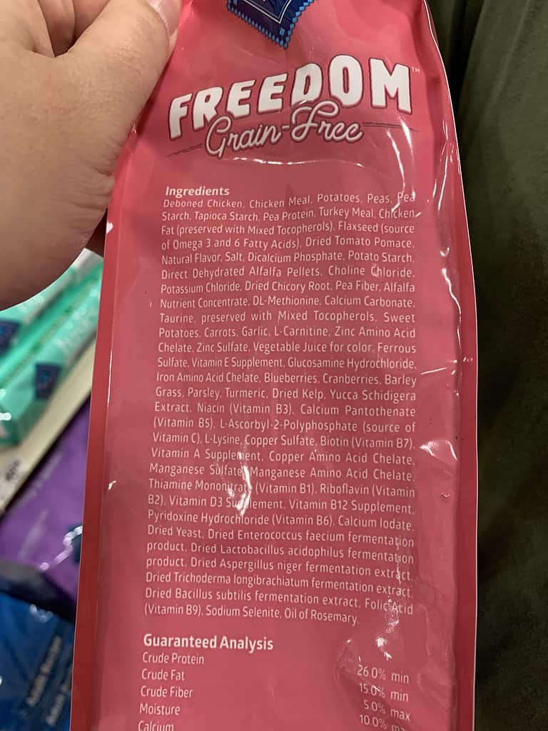 Ingredients list from Blue Buffalo grain-free Freedom kibble bag - Small Breed Adult Recipe