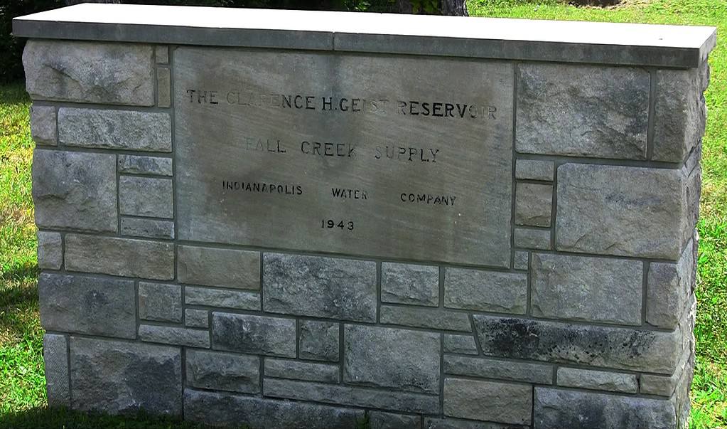 Dedication monument near Geist Reservoir dam, in Indiana, United States. It reads, "The Clarence H. Geist Reservoir, Fall Creek Supply, Indianapolis Water Company, 1943".