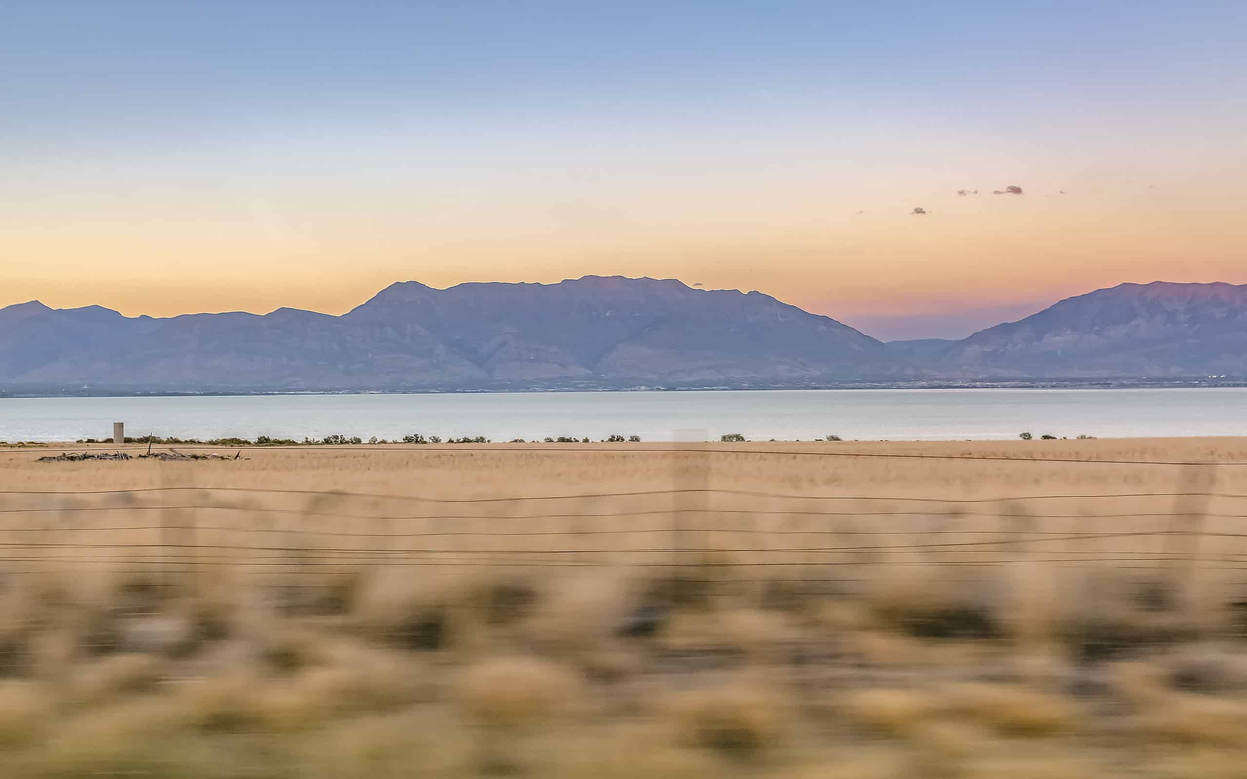 Utah Lake against mountain seen from Highway 68