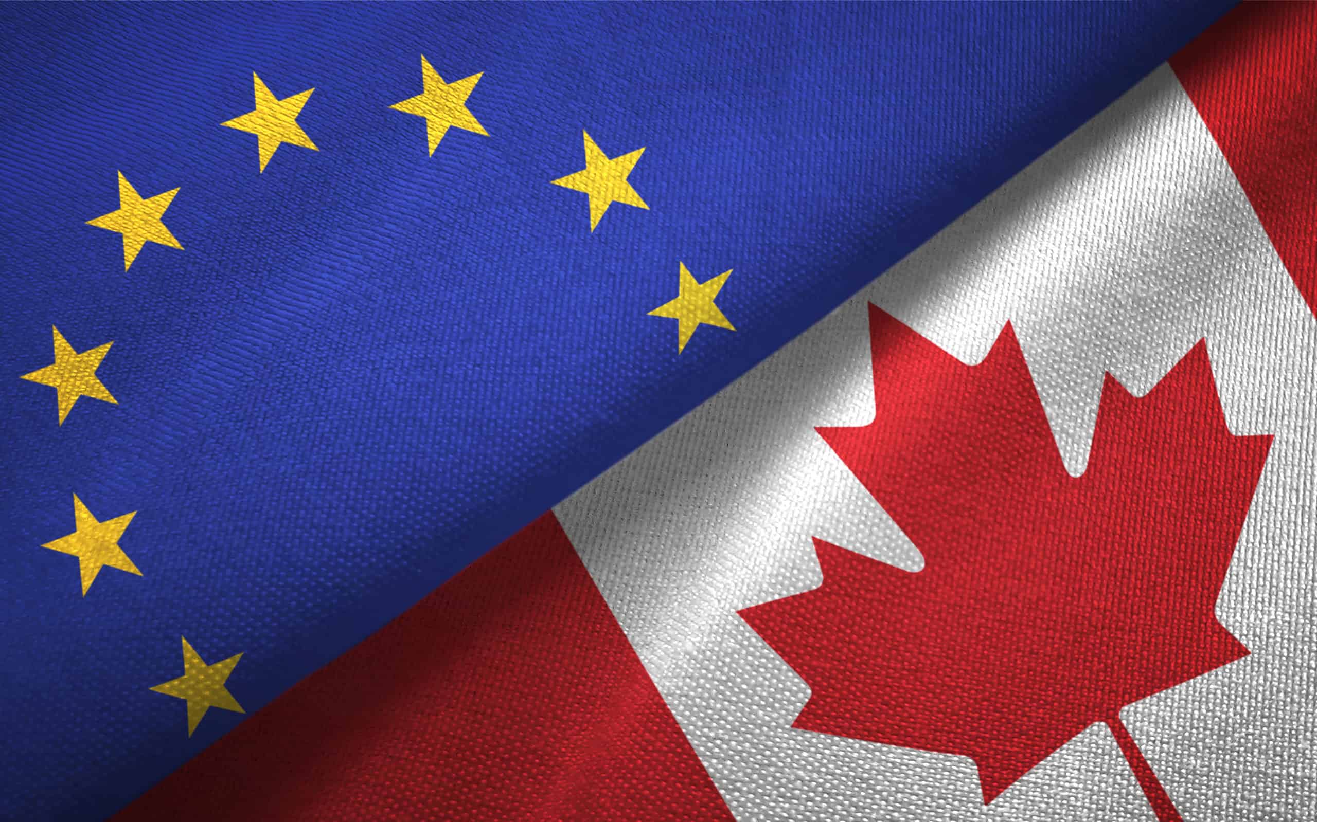 Canada and European Union two flags together realations textile cloth fabric texture