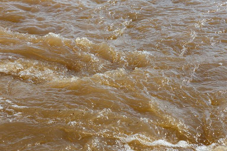 Muddy river water