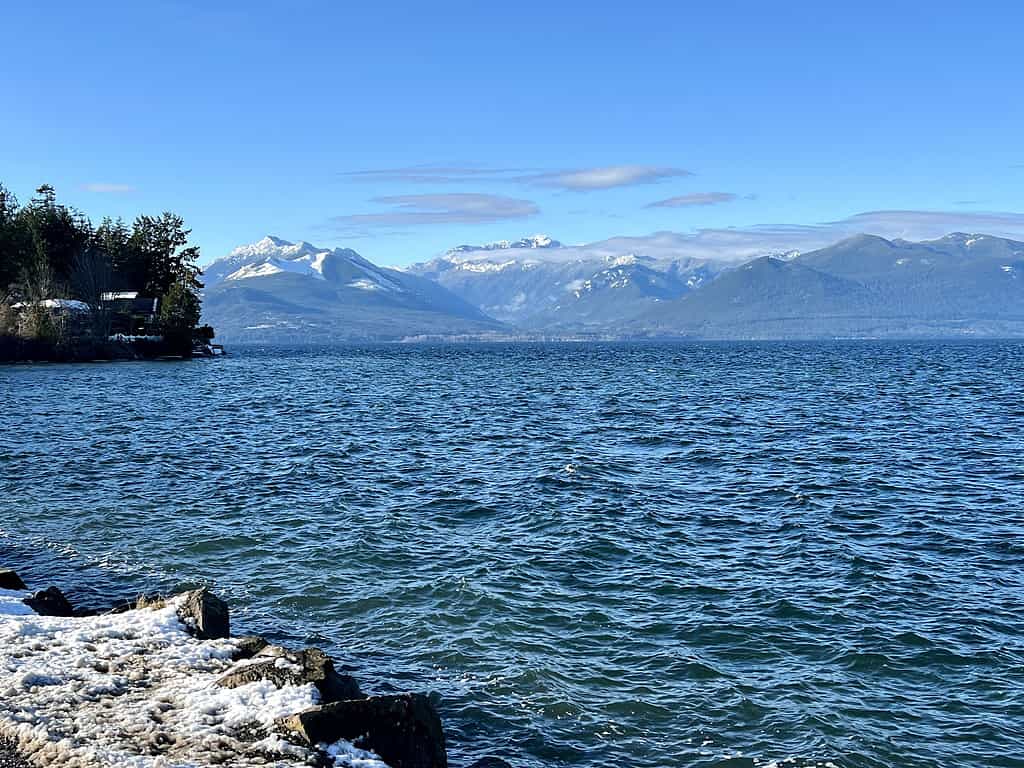 Hood Canal is west of Seattle between the Kitsap and Olympic Peninsulas.