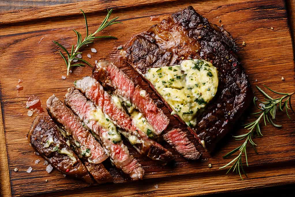 Sliced grilled steak Ribeye with herb butter