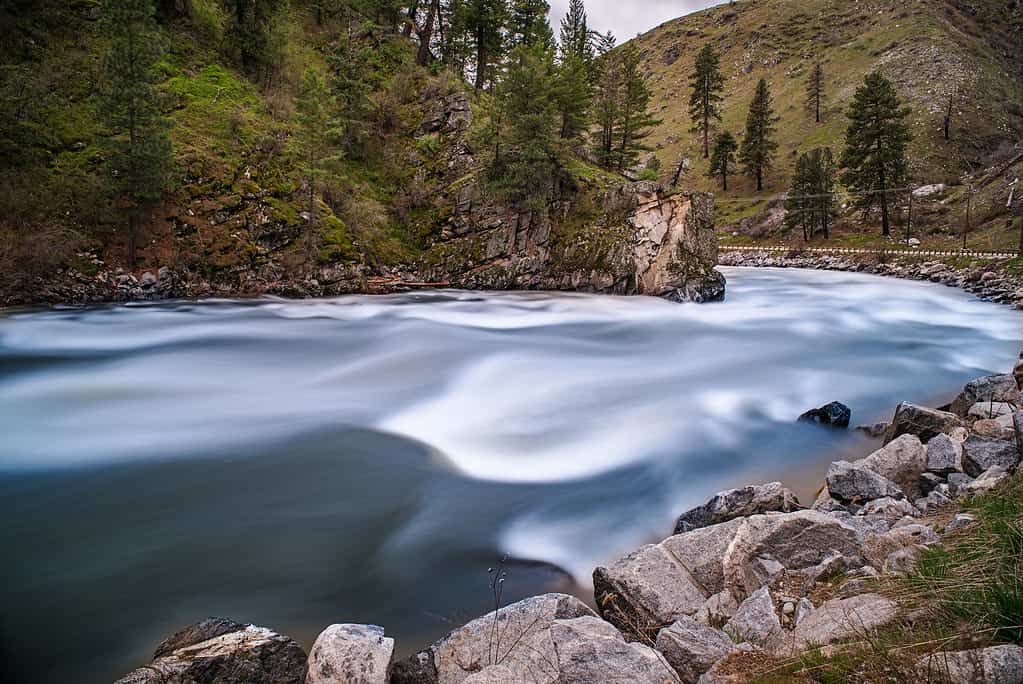 Day time silky water flow of Payette River