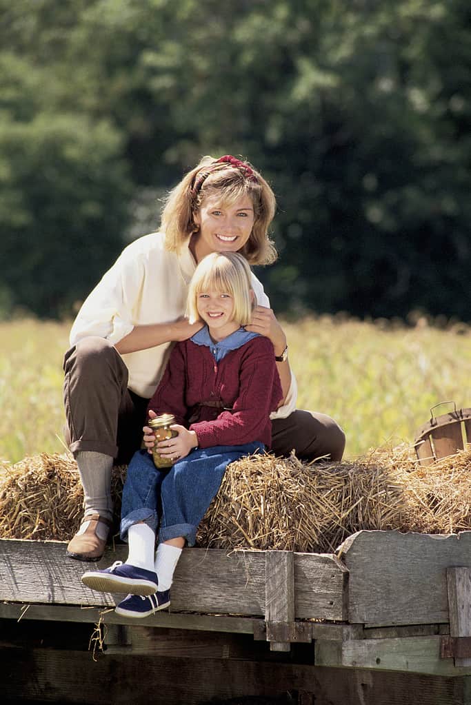 Portrait of mother and daughter hayride