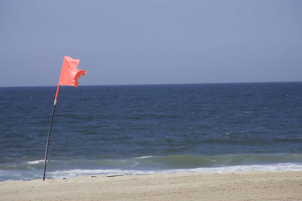 Warning flag on redodo beach