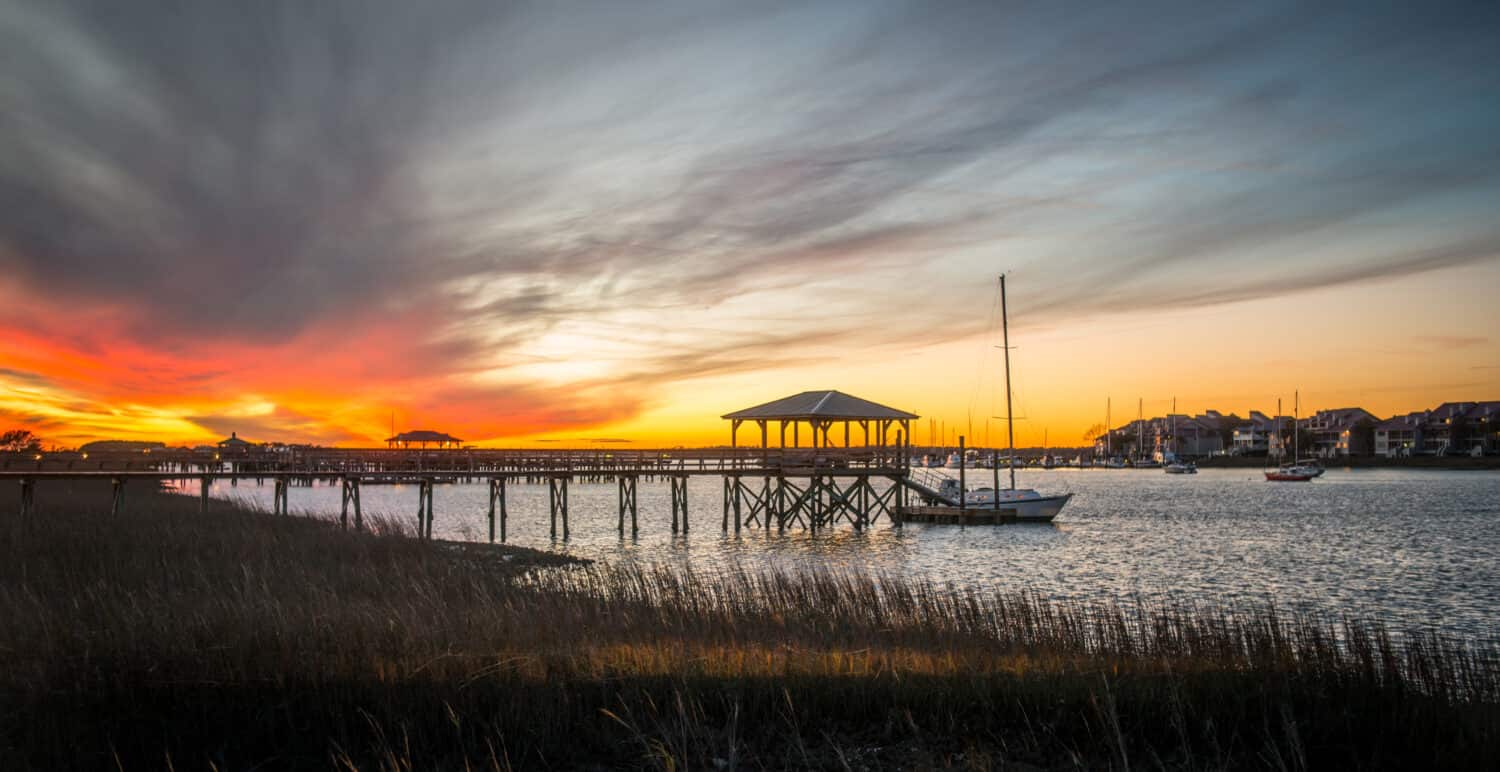 A fiery sunset stretches over James Island, near Charleston, SC.