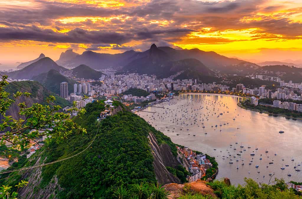 Sunset view of Corcovado, Botafogo and Guanabara bay in Rio de Janeiro, Brazil. Skyline of Rio de Janeiro. Sunset cityscape of Rio de Janeiro