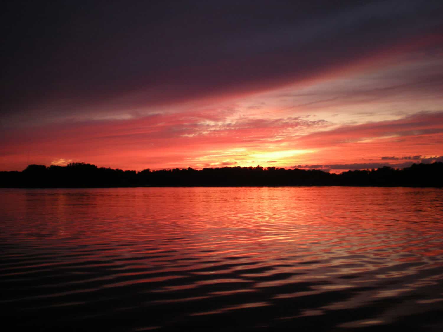                   Sun set on prior lake in Minnesota             