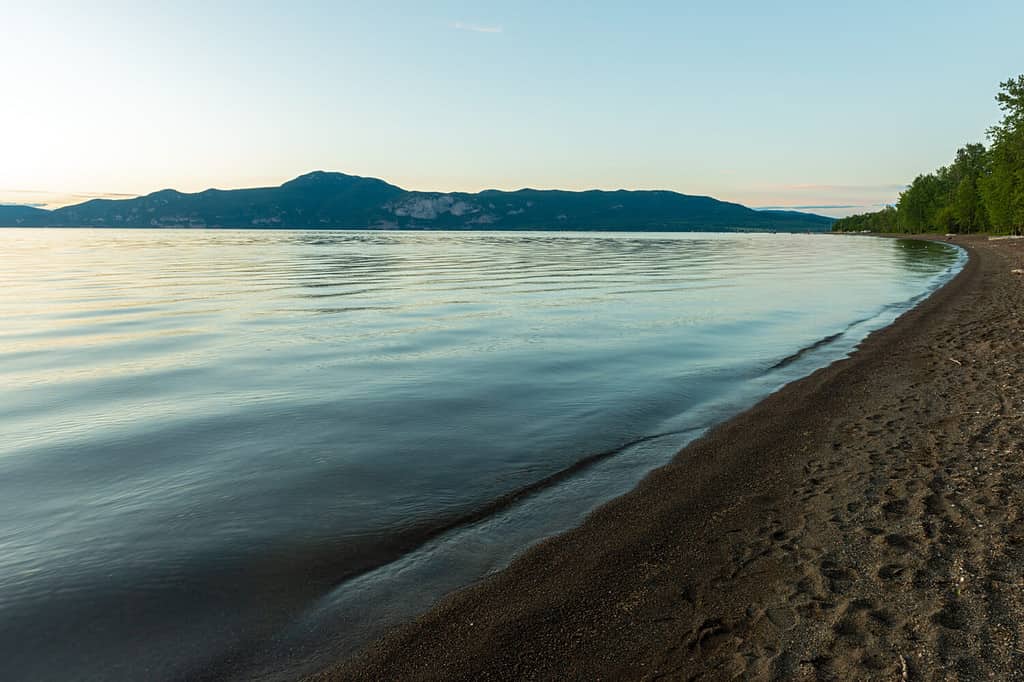 The sandy shore of Stuart Lake in Paarens Beach Provincial Park, British Columbia, Canada