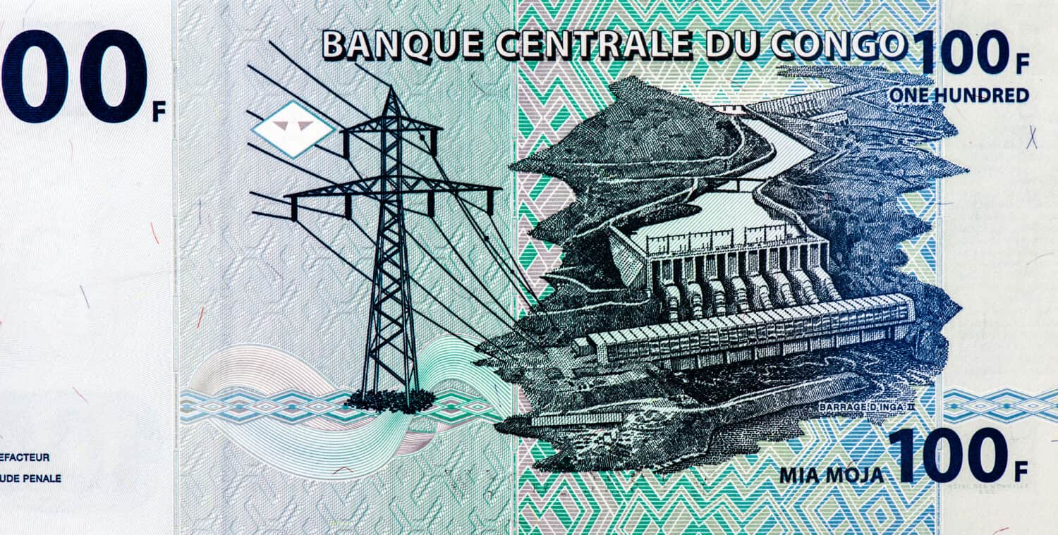 High voltage power lines. Inga II hydroelectric dam and power station on Congo River. Portrait from Congo Democratic Republic 100 Francs 2007 Banknotes.  Collection.