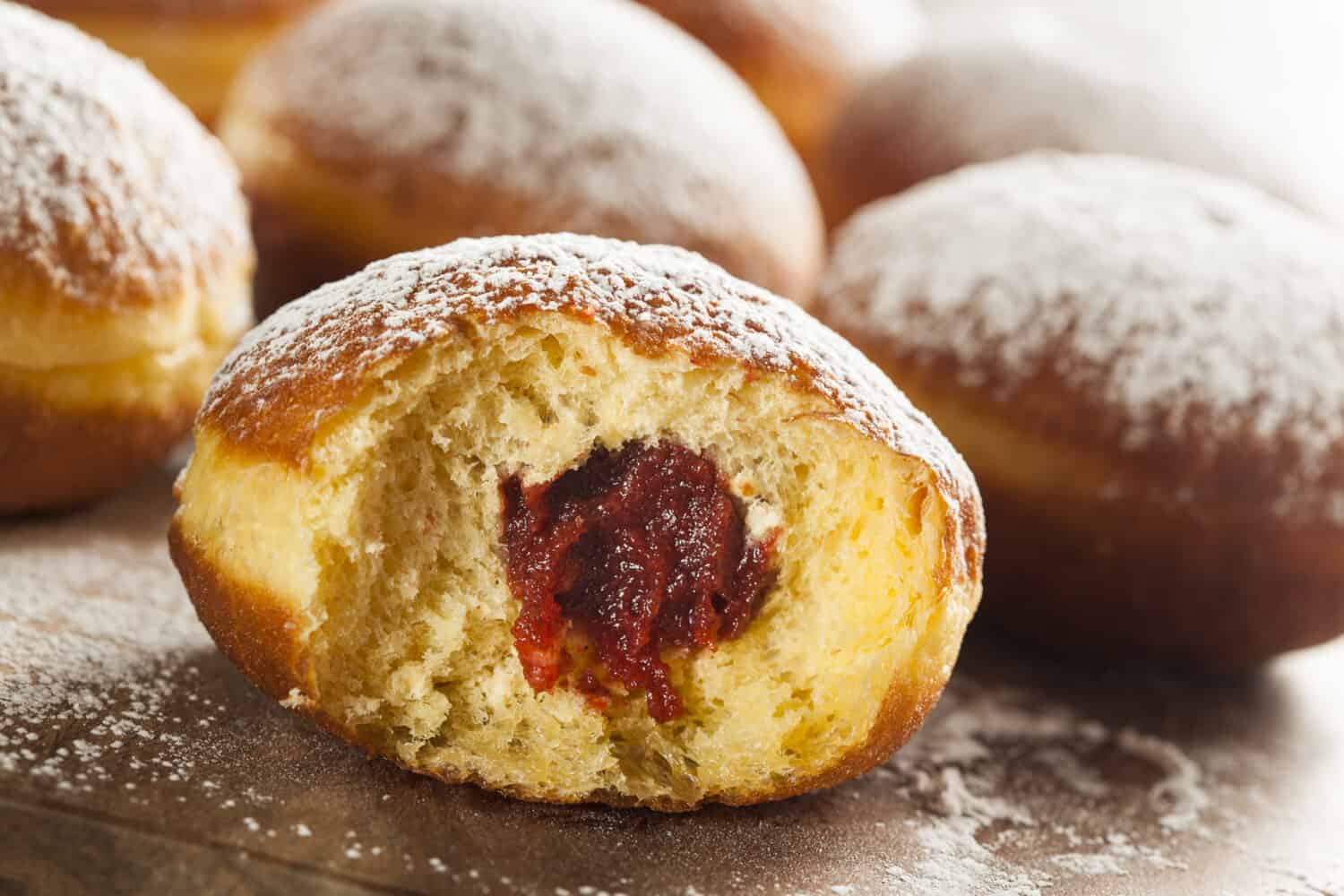 Homemade Raspberry Polish Paczki Donut with Powdered Sugar