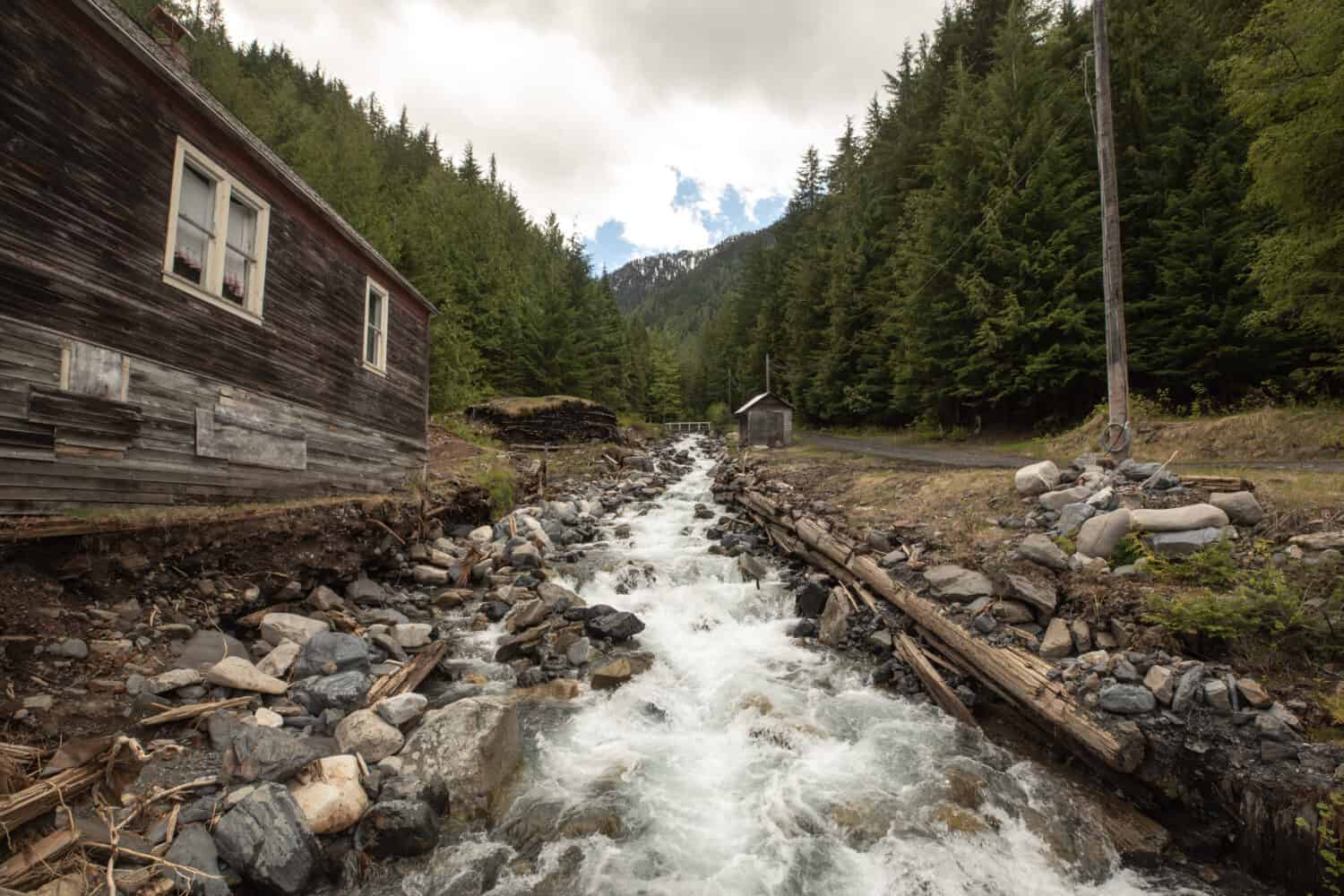 River leading up to the mountains in an old abandoned silver mining town. Sandon, bc canada