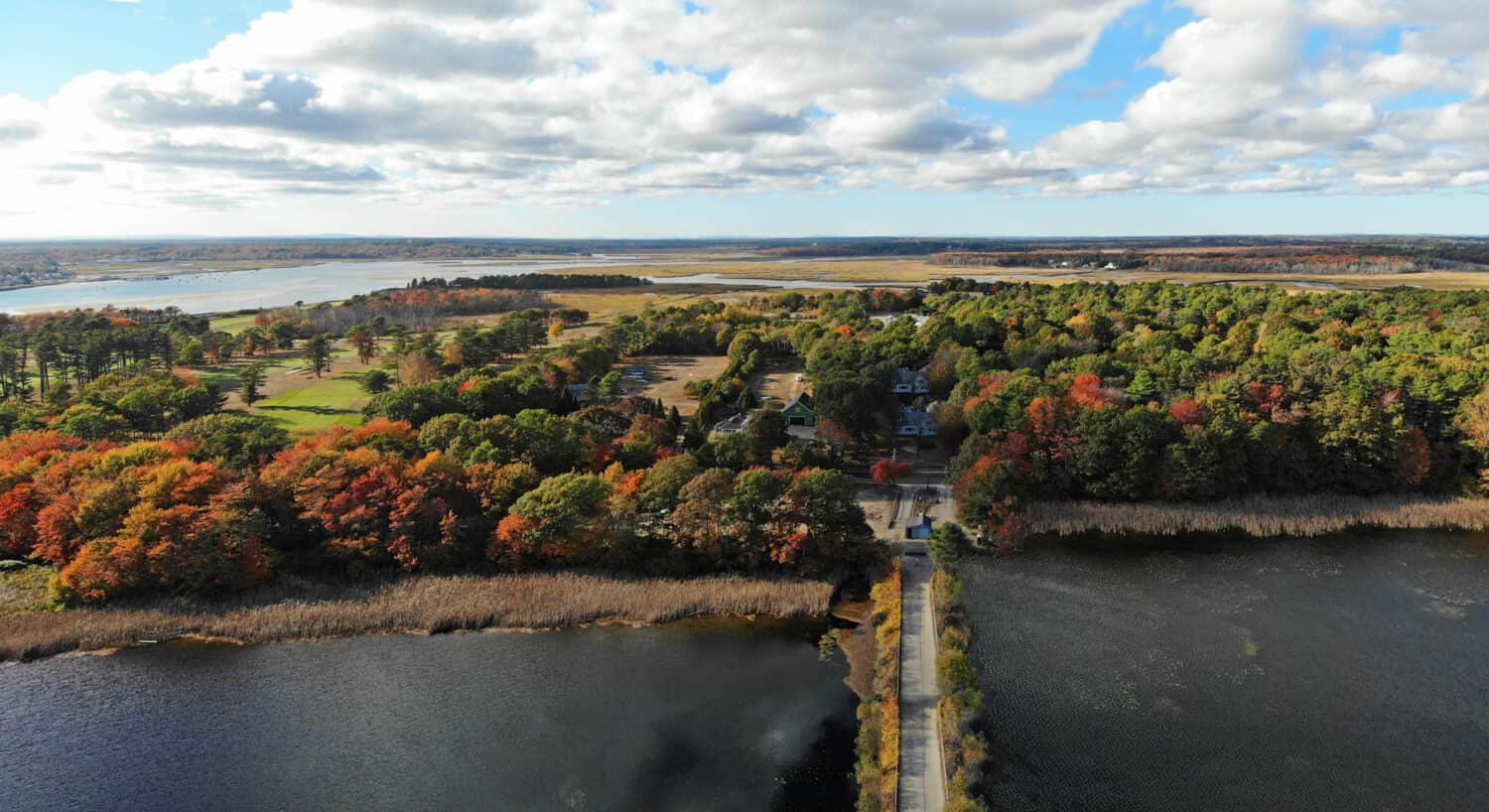 Aerial view of colorful autumn foliage over the Scarborough Beach State Park near Portland, Maine, United States