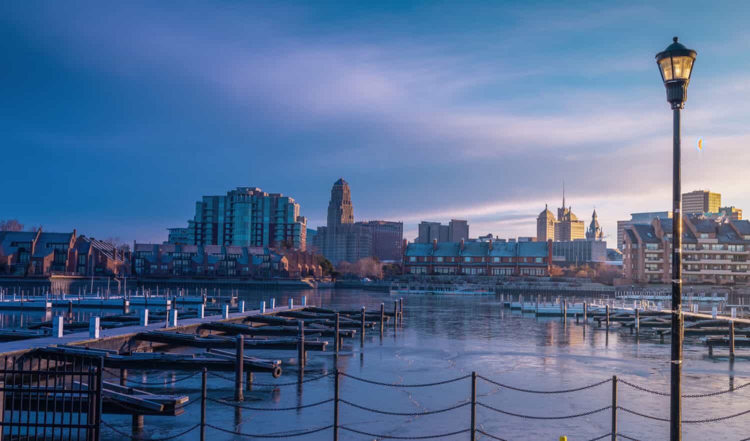 January 9th, 2021 -Buffalo NY USA: Buffalo cityscape view at early cold morning from erie basin marina.