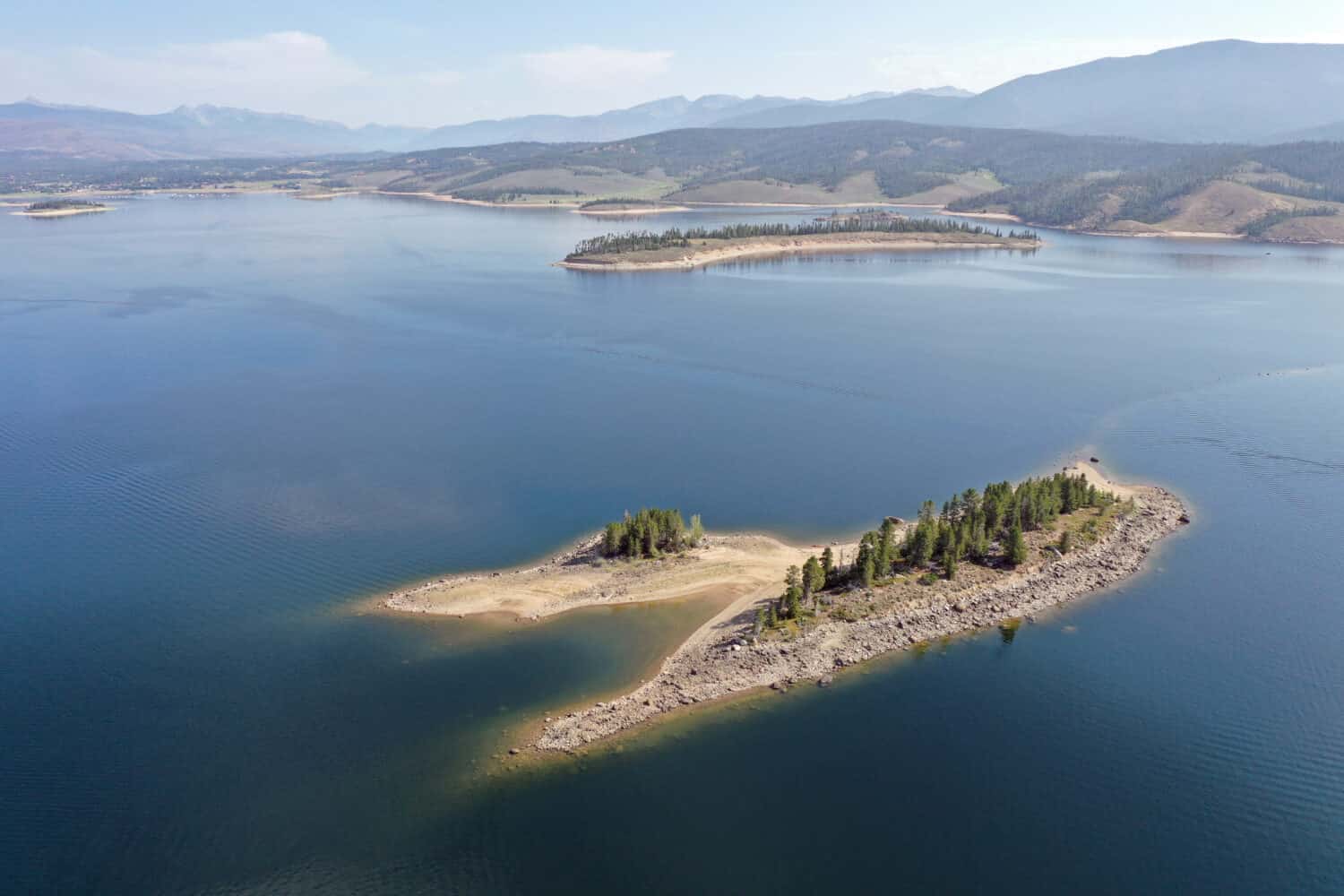 Aerial view of Deer Island on Lake Granby, Colorado on calm sunny summer morning.