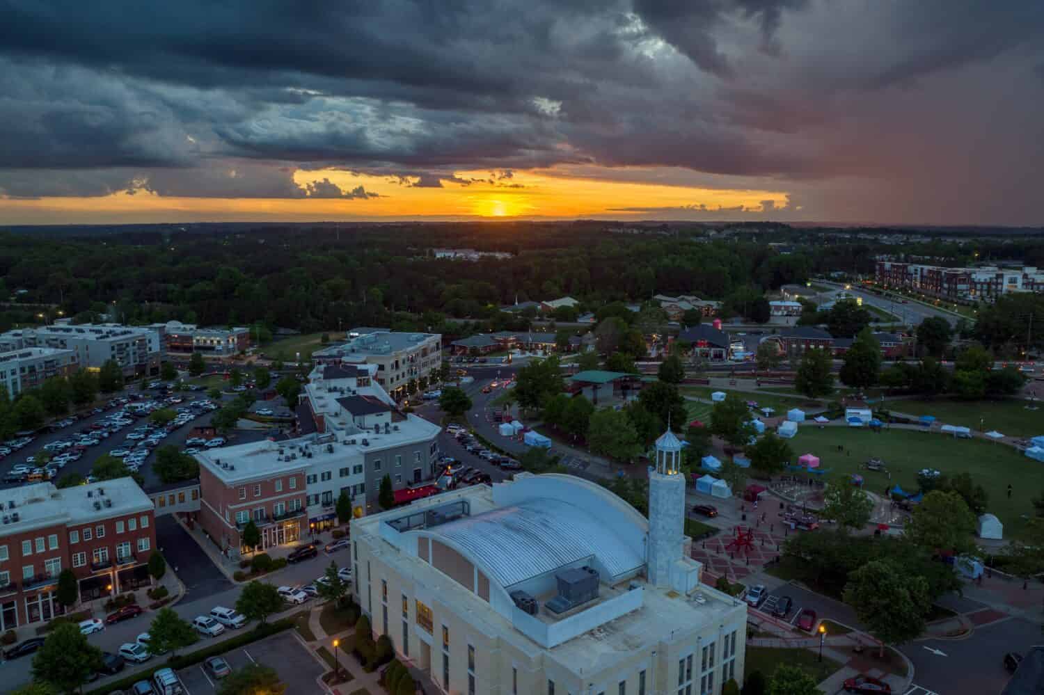 Suwanee town center at sunset with a storm approaching