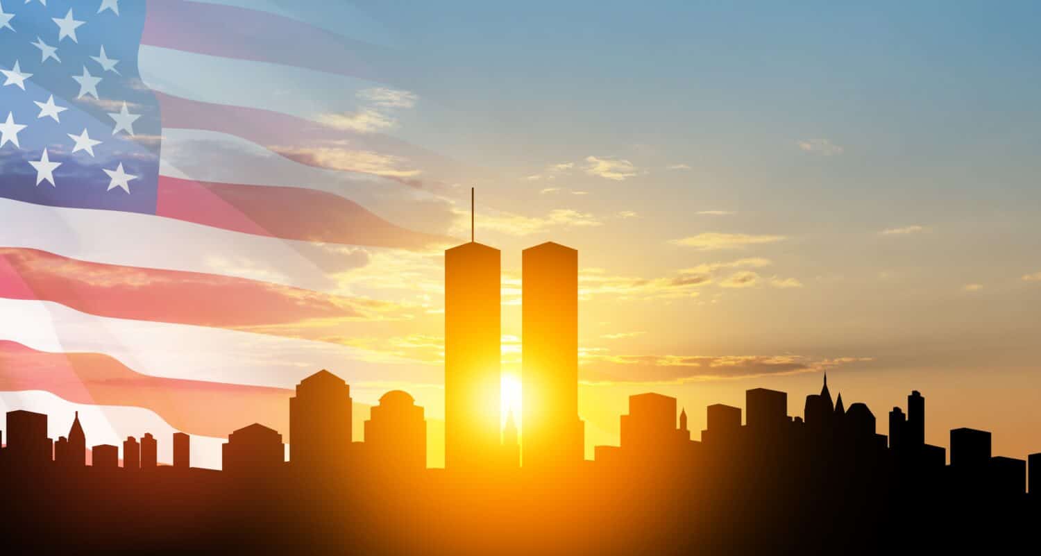 New York skyline silhouette with Twin Towers and USA flag at sunset. 09.11.2001 American Patriot Day banner. NYC World Trade Center.