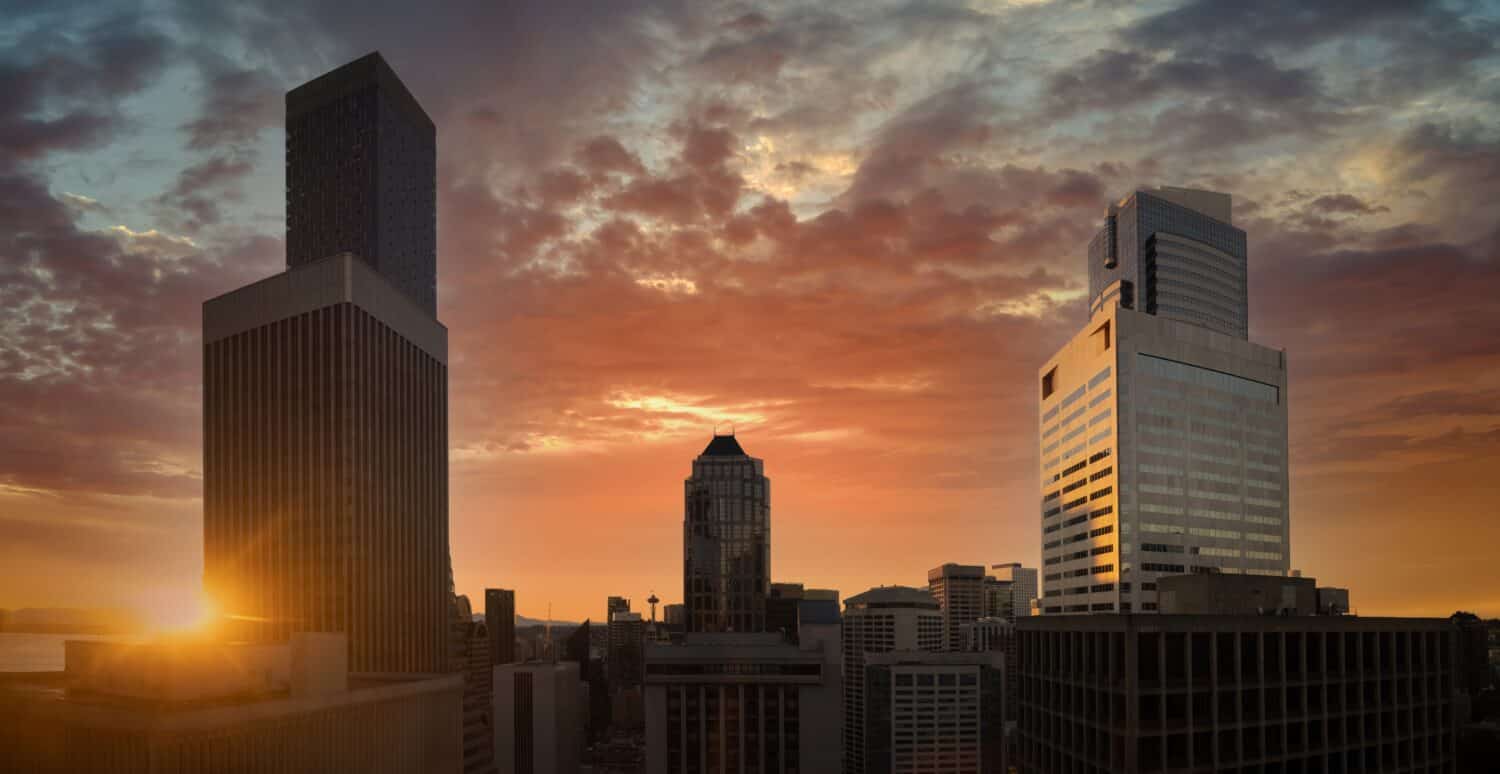 USA, Panoramic Seattle financial district and business center skyline at sunset in city downtown.
