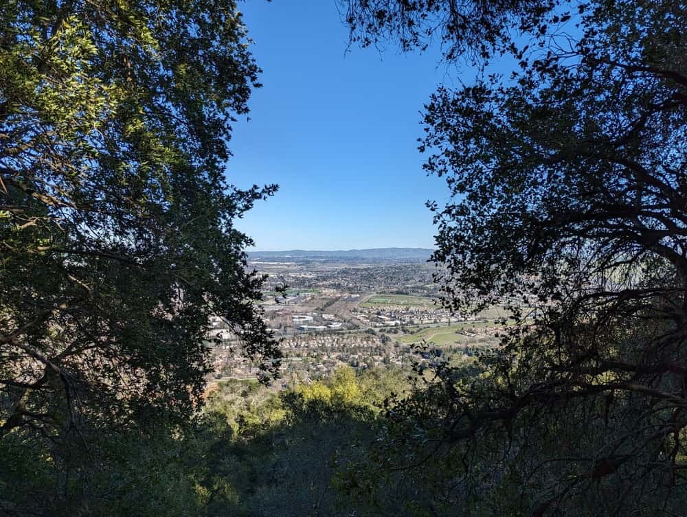 city landscape from Castleridge Trail Head, trees in the mountains at Pleasanton Ridge Regional Park