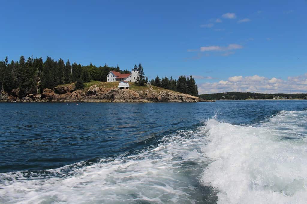 Amazing views of a lighthouse along the shore of Swans Island, Maine.