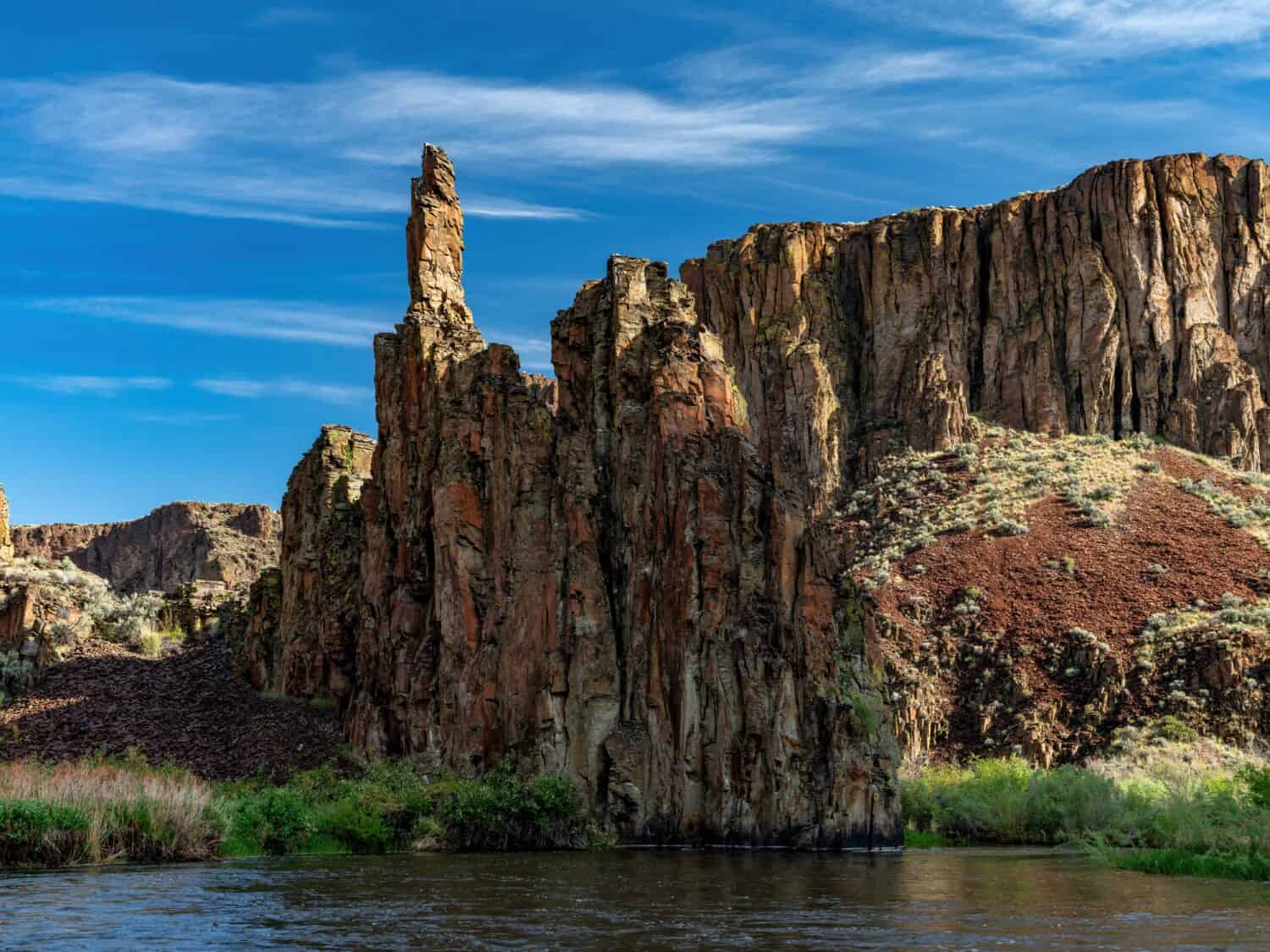 Owyhee River rock formations with blue sky above