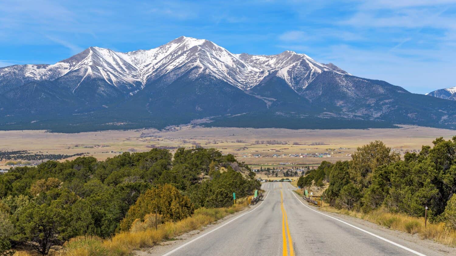 Mount Princeton - A panoramic Spring morning view of Snow-capped Mount Princeton, towering above Buena Vista at Arkansas Valley, as seen from U.S. Route 285, Colorado, USA.