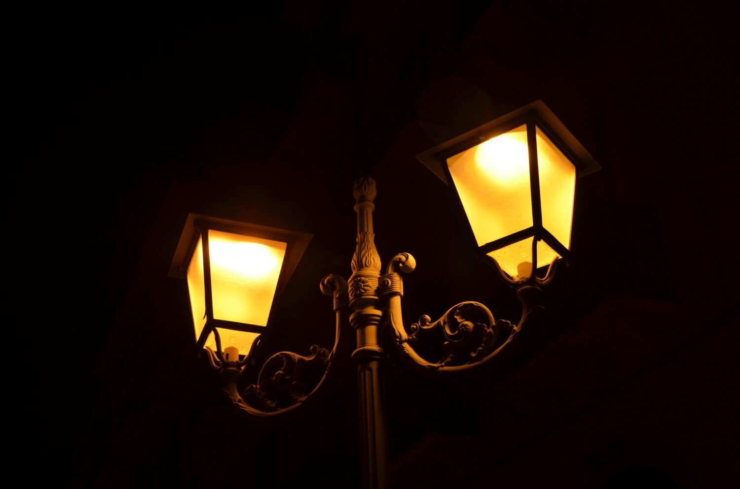 Vintage street lamps illuminating the dark night