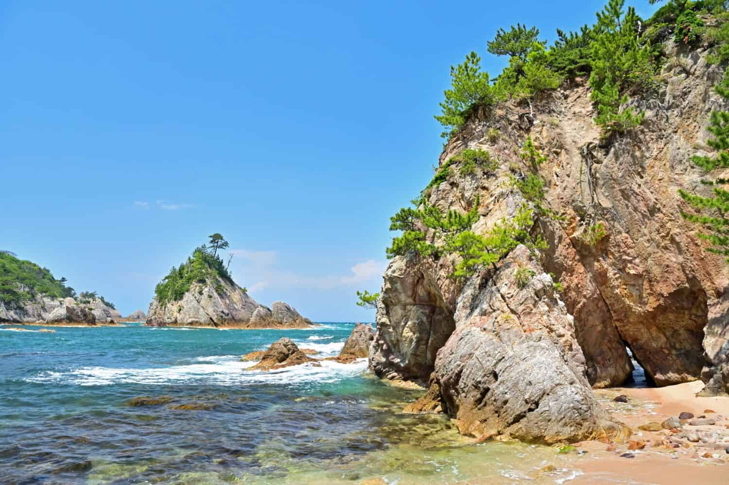 Scenery of Kamogaiso beach and Sakamori cave mouth in Uradome coat, Iwami, Tottori prefecture, Japan