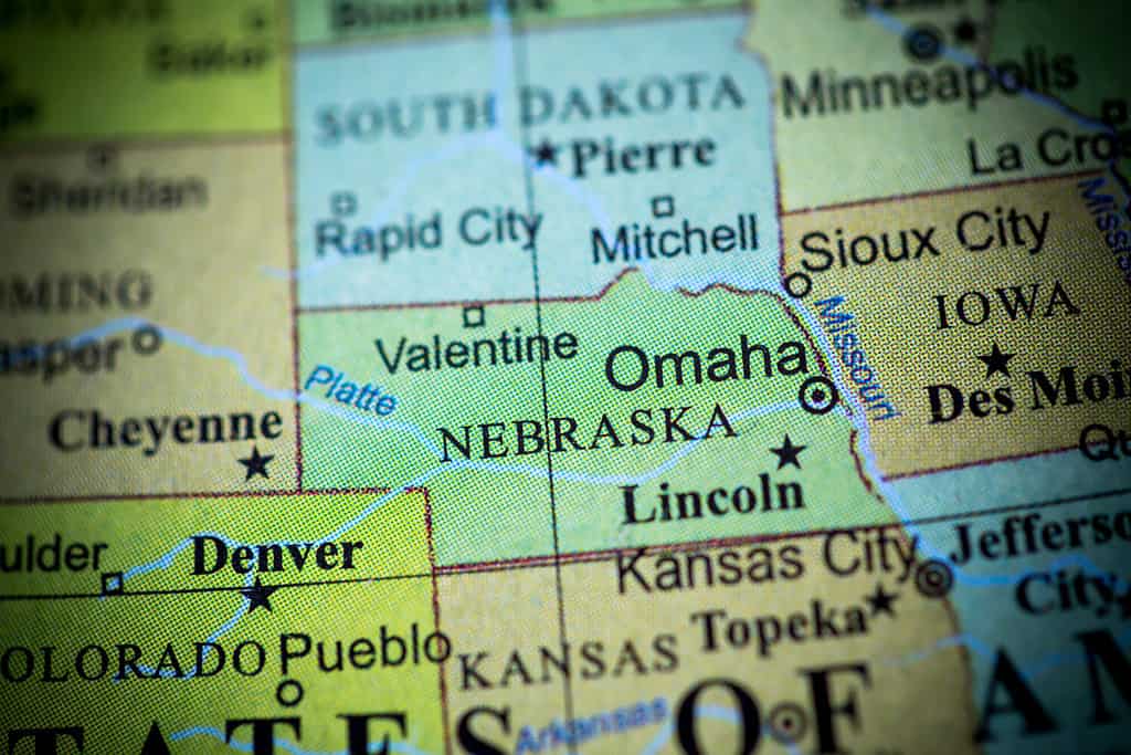 Map view of Nebraska on a geographical globe. (vignette)