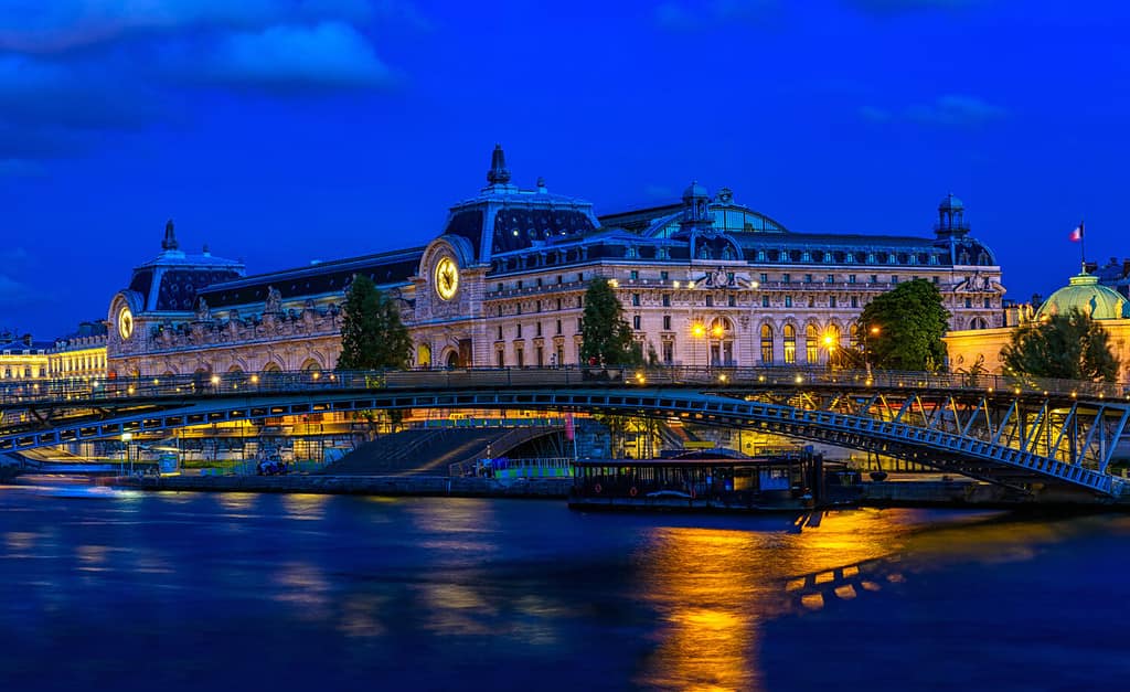Orsay Museum (Musee d'Orsay) in Paris, France. Night cityscape of Paris. Architecture and landmark of Paris