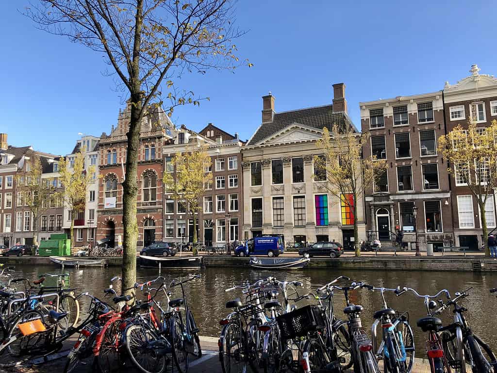 Amsterdam bikes walk canal pride gay rainbow