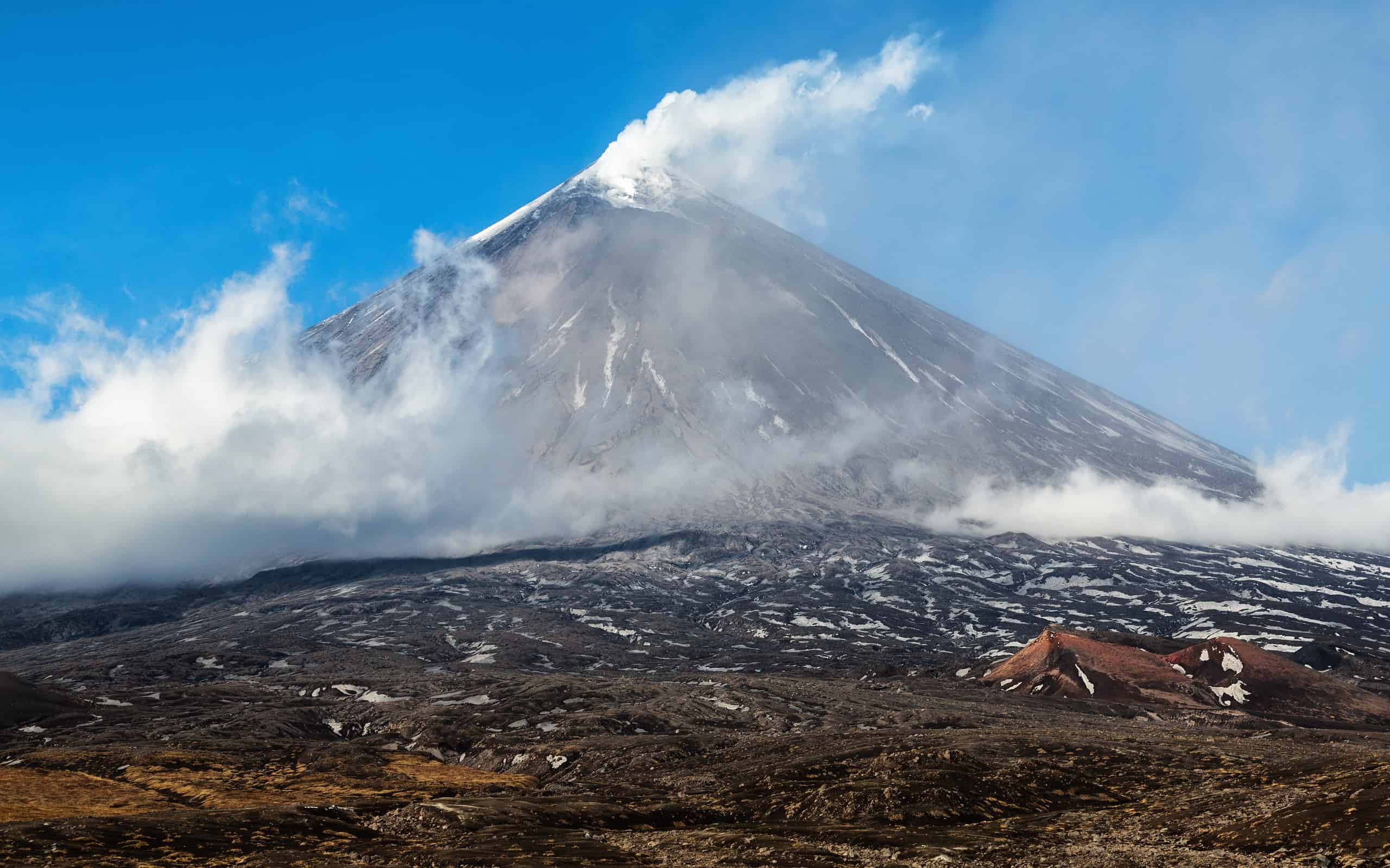 Autumn mountain landscape view of eruption active volcano
