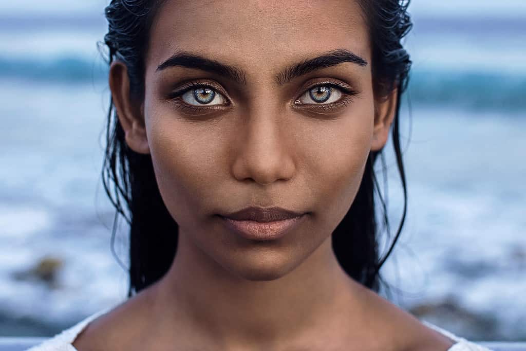 Beautiful portrait of indian woman with blue eyes