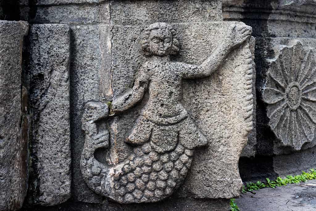Details of colonial fountain with a mermaid sculpture in antigua guatemala