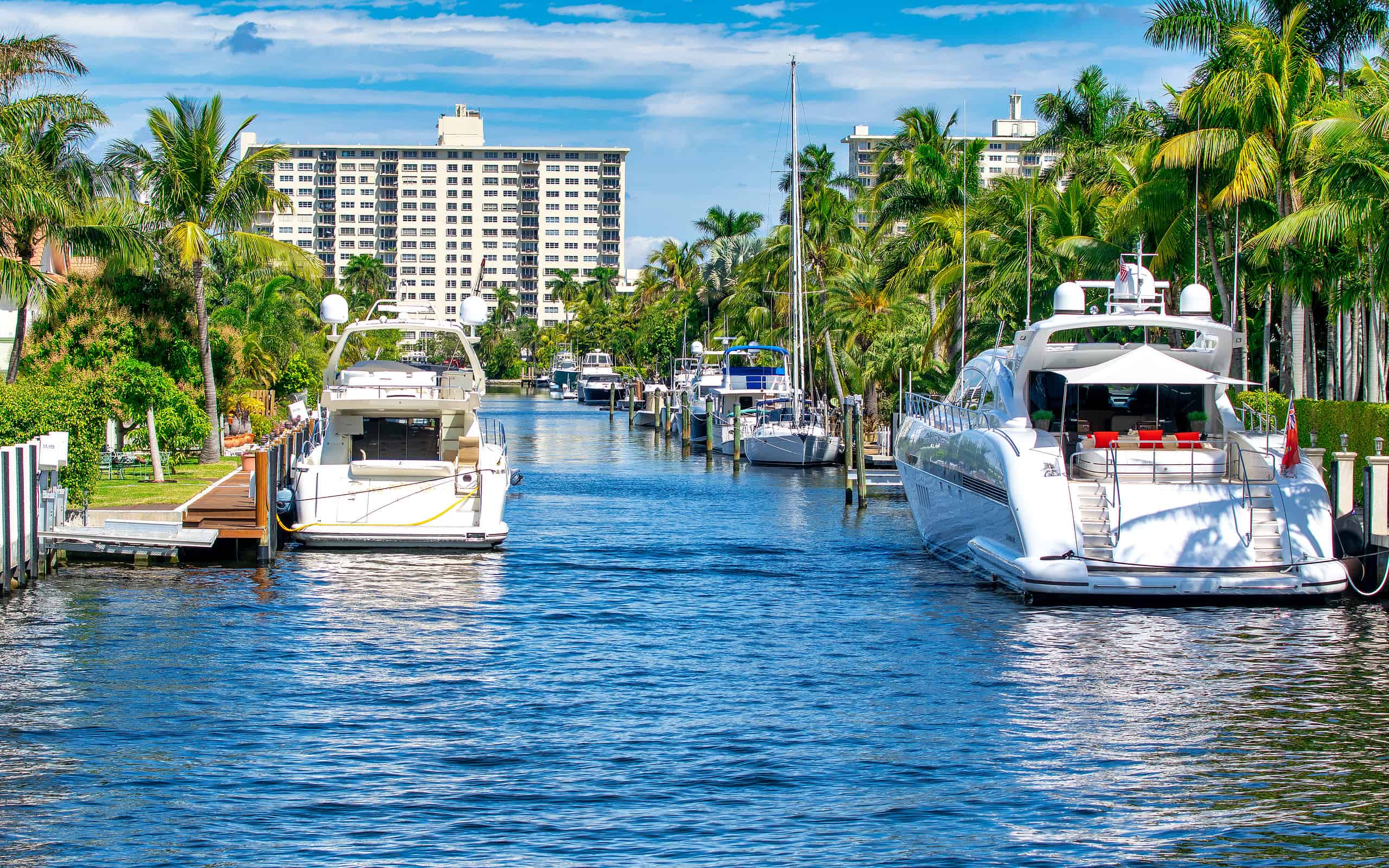 Boats along Fort Lauderdale Canals on a sunny day, Florida.