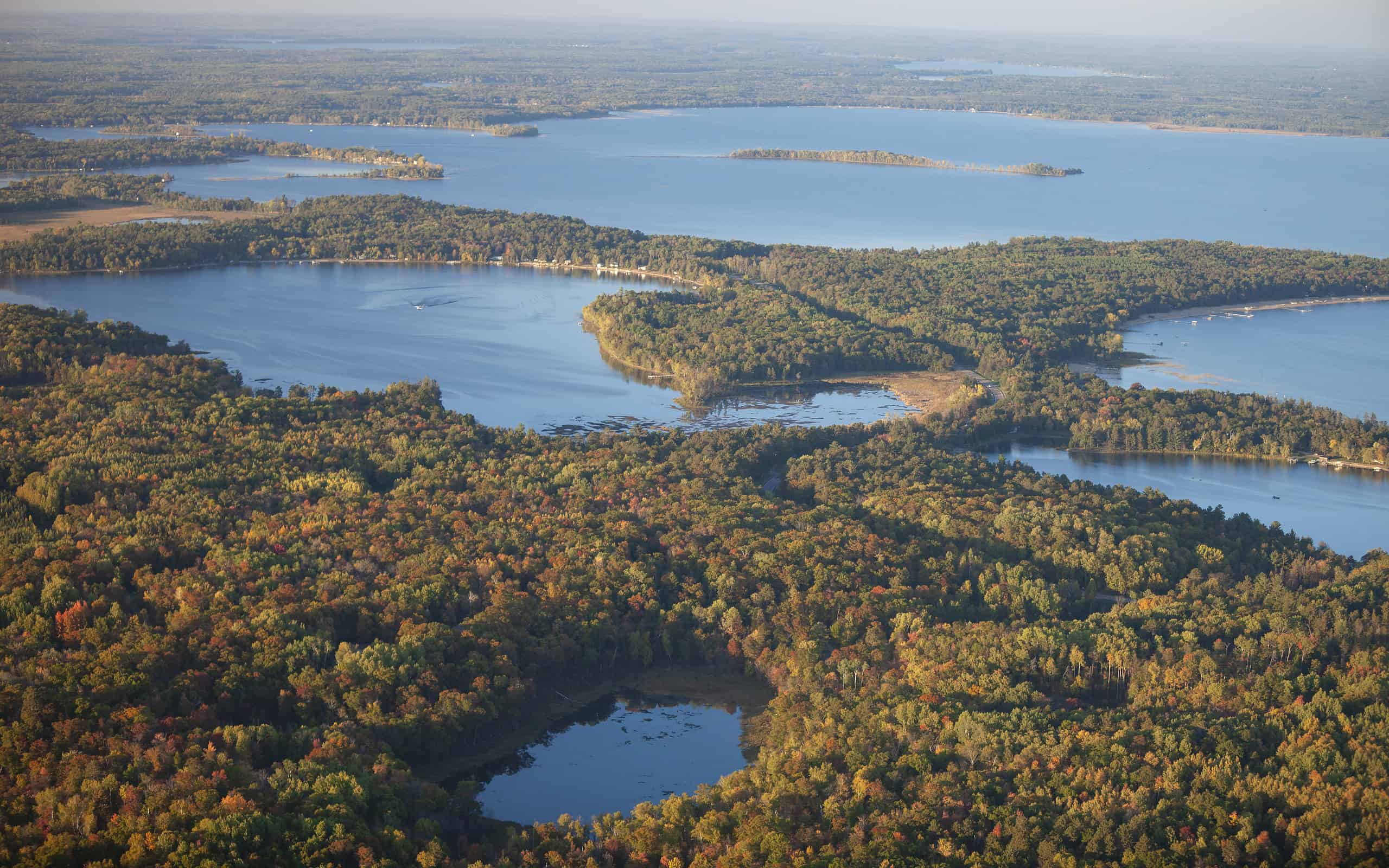 Aerial view of lakes and trees in autumn color near Brainerd Minnesota