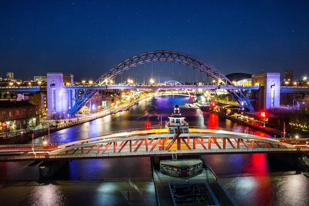 The city of Newcastle uponTyne and Gateshead River Tyne bridges at night, North East England.