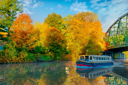 Canal Boat and Bridge over the Erie Canal in fall-Pittsford, New York