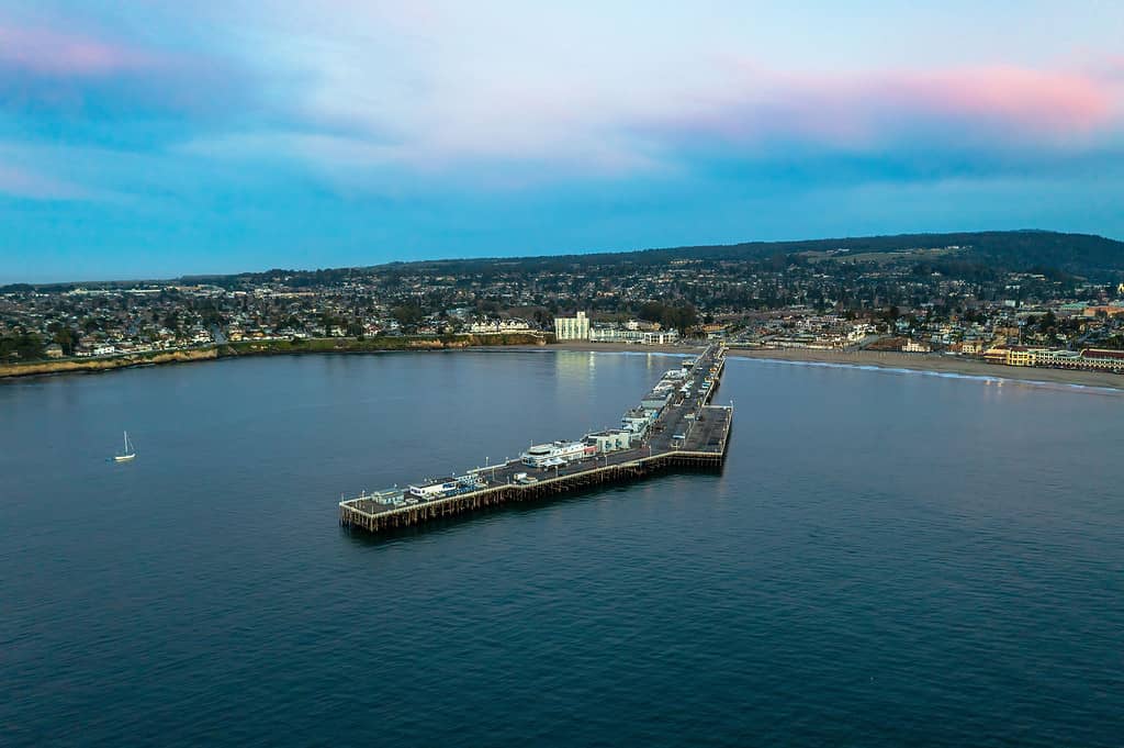 Aerial view of Santa Cruz Pier and the beautiful town in the background in California