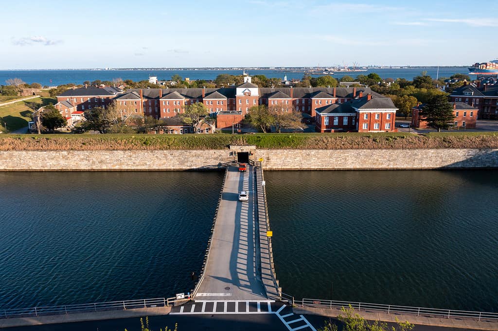 Aerial View of cars driving on a bridge leading to leading to Fort Monroe in Hampton