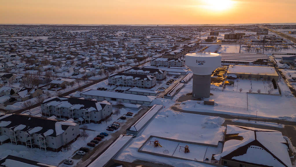 Sunset over the city. Fargo, North Dakota. Snow storm in town