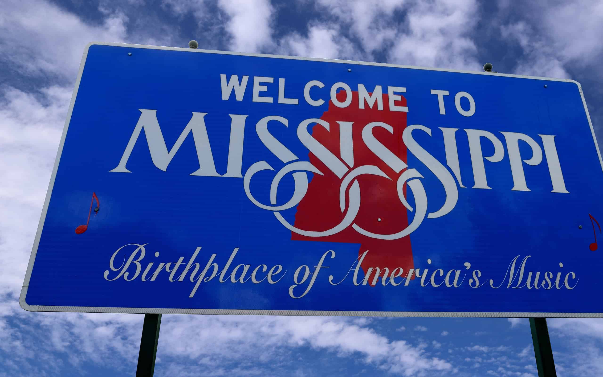 Mississippi Travel Sign with clouds