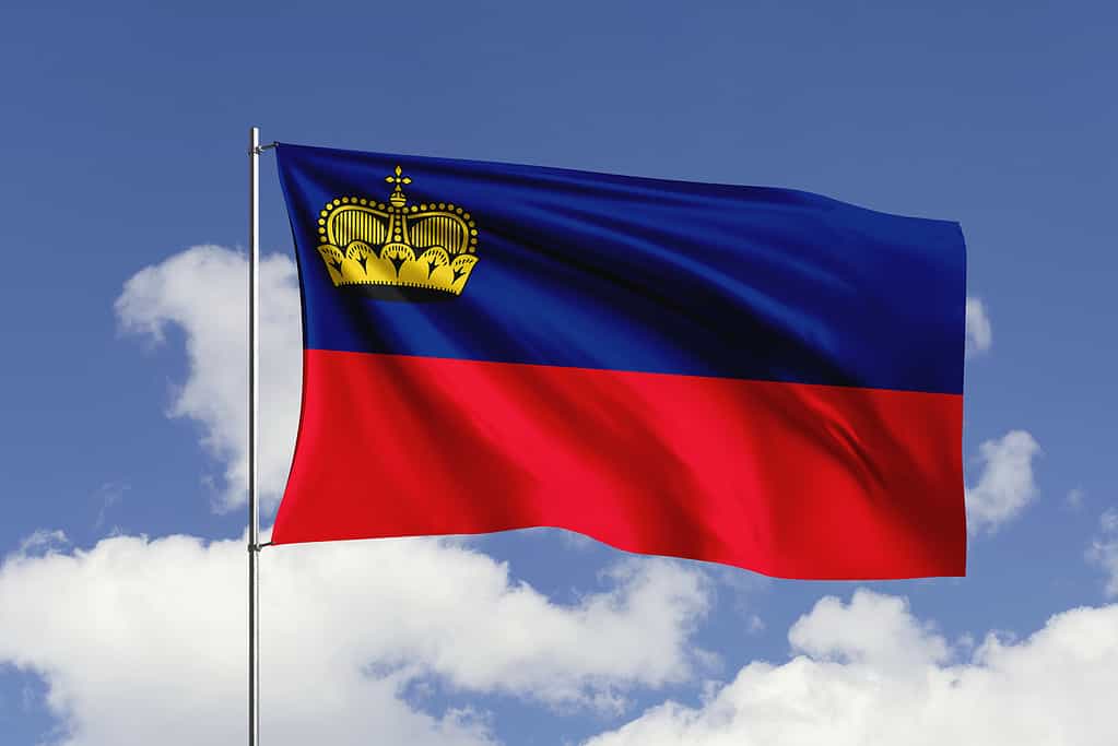 Liechtenstein flag fluttering in the wind on sky.