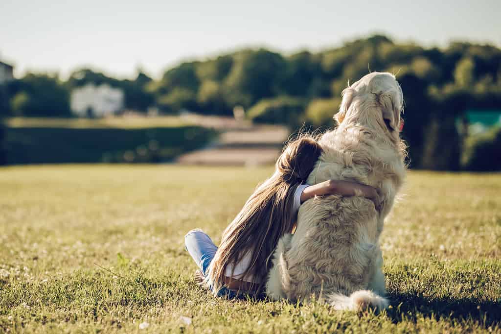 Little cute girl with dog