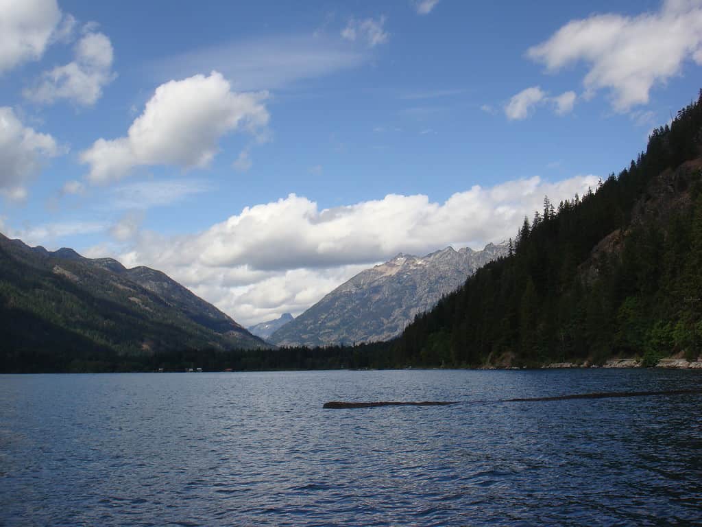 Lake Chelan showing a wide open sky with mountains. 