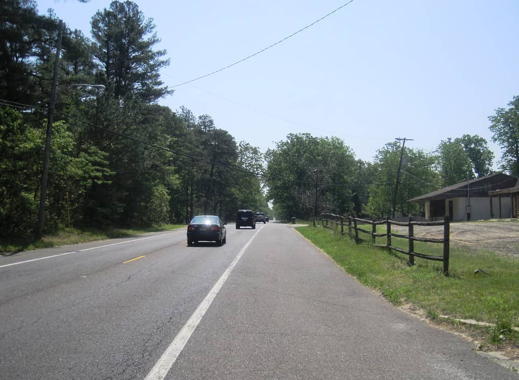 Magnolia County Road, which is County Route 644, passes through Ong's Hat, New Jersey, in the Brendan T. Byrne State Forest.